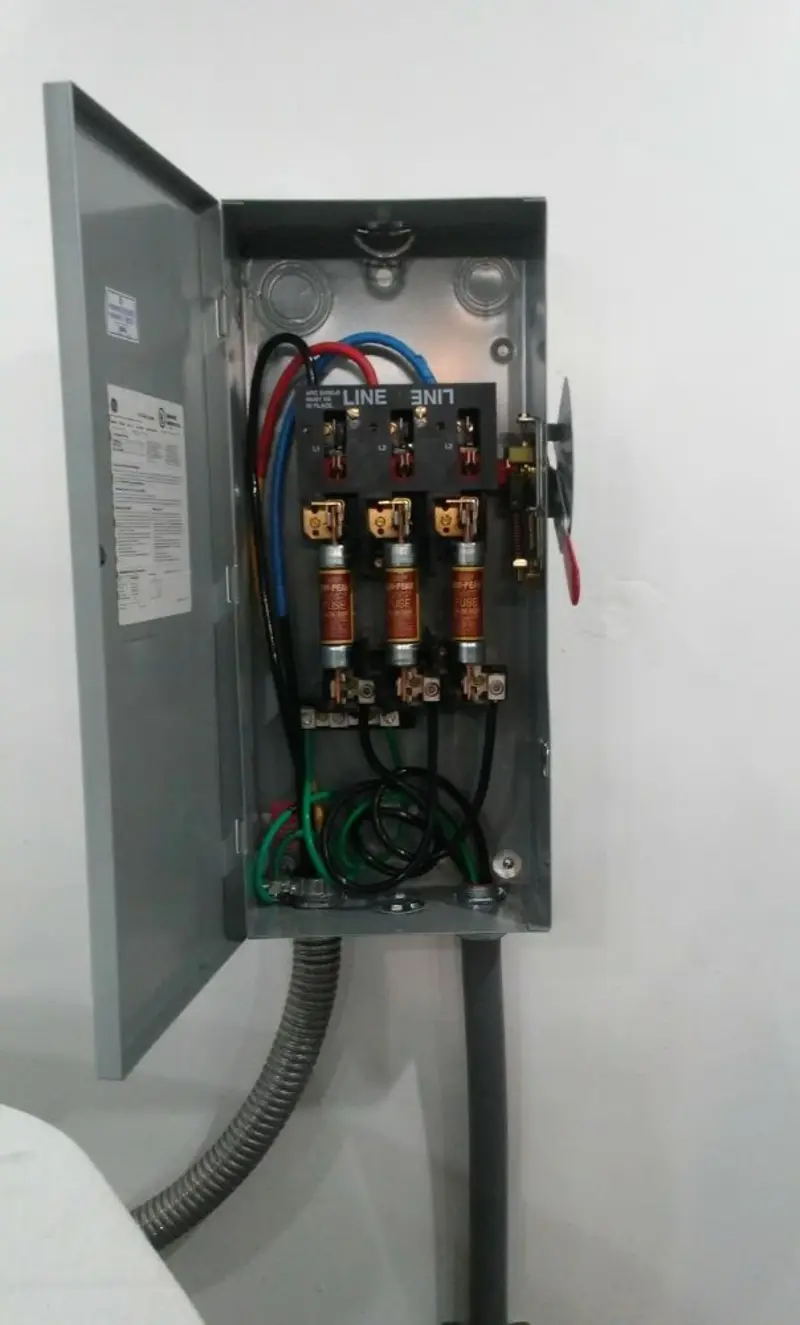 Three-phase disconnect switch installed for Smoke Detector Installation in Hurricane